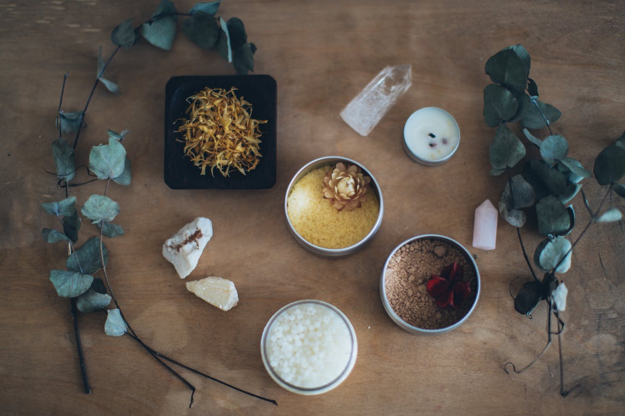services-01 A calming flat lay of bath salts, candles, and leaves, perfect for a soothing home spa experience.